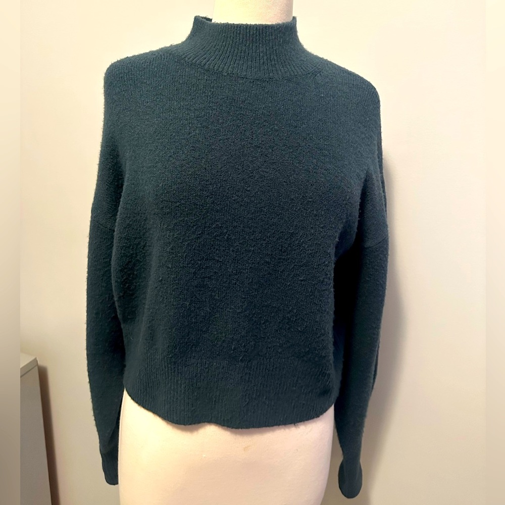 Woolen Bloom mock neck sweater